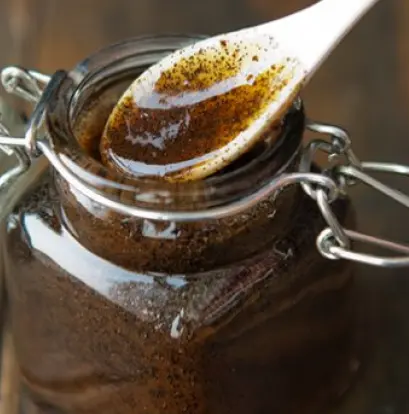 Vanilla Royal vanilla bean paste showing dense black seed specks in dark brown paste